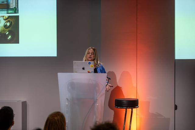 Speaker giving a talk at React Paris 2025