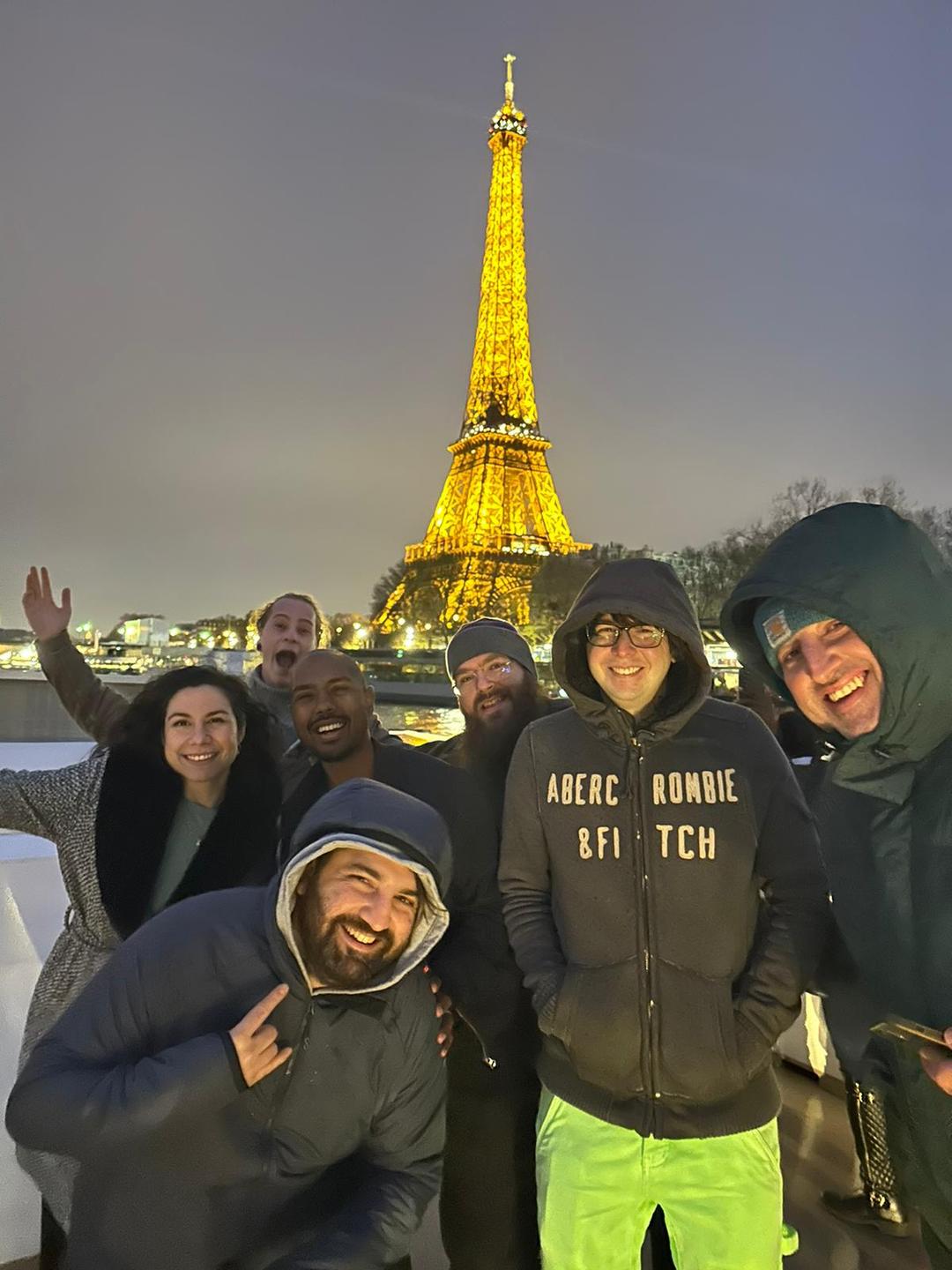 React Paris speakers in front of the eiffel tower